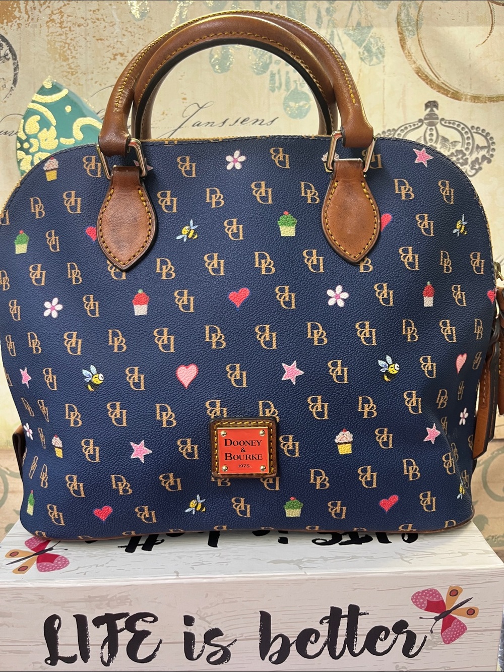 Dooney & Bourke Navy Satchel with Brown Trim and Multicolor Motifs
